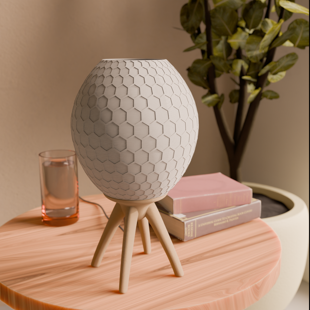 Pollen table lamp with honeycomb-textured shade on tripod base, view 2