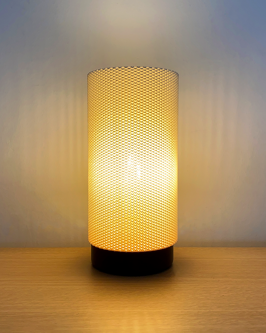 Eva adaptive lamp with RippleMesh shade, usable as table lamp or pendant