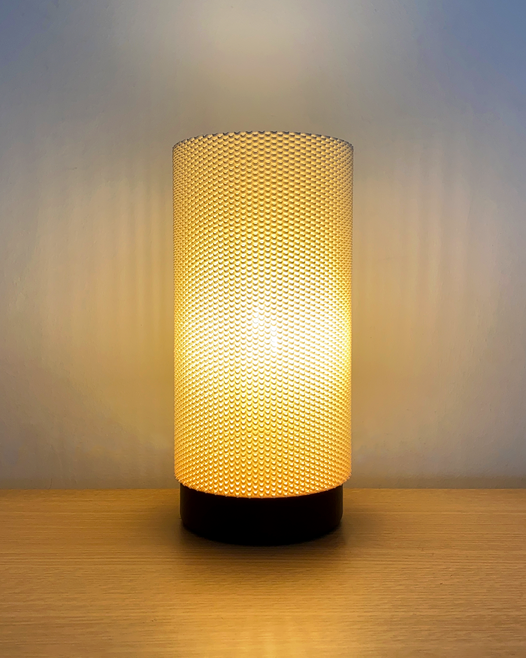 Eva adaptive lamp with RippleMesh shade, usable as table lamp or pendant