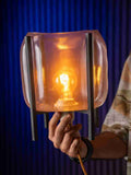 Inflate table lamp with puffy rounded shade on sculptural base