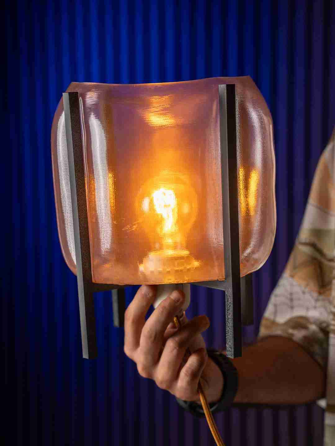 Inflate table lamp with puffy rounded shade on sculptural base