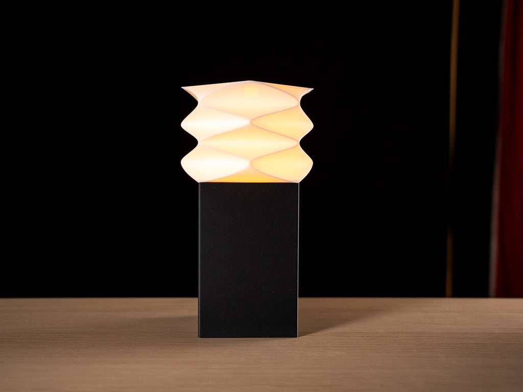 Stele monolithic pillar table lamp with glowing white top, view 2
