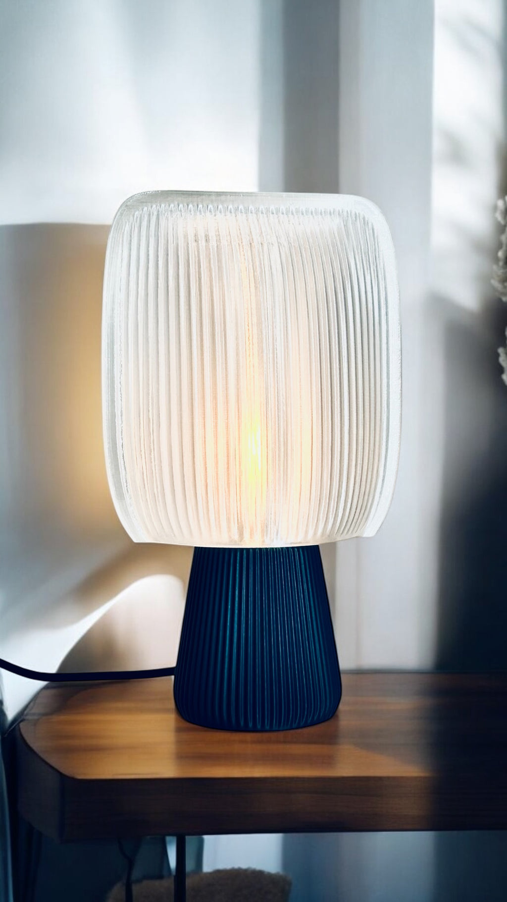 Bliss table lamp with soft pillow-shaped shade on a round base, view 2