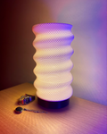 Springy adaptive lamp with playful RippleMesh shade