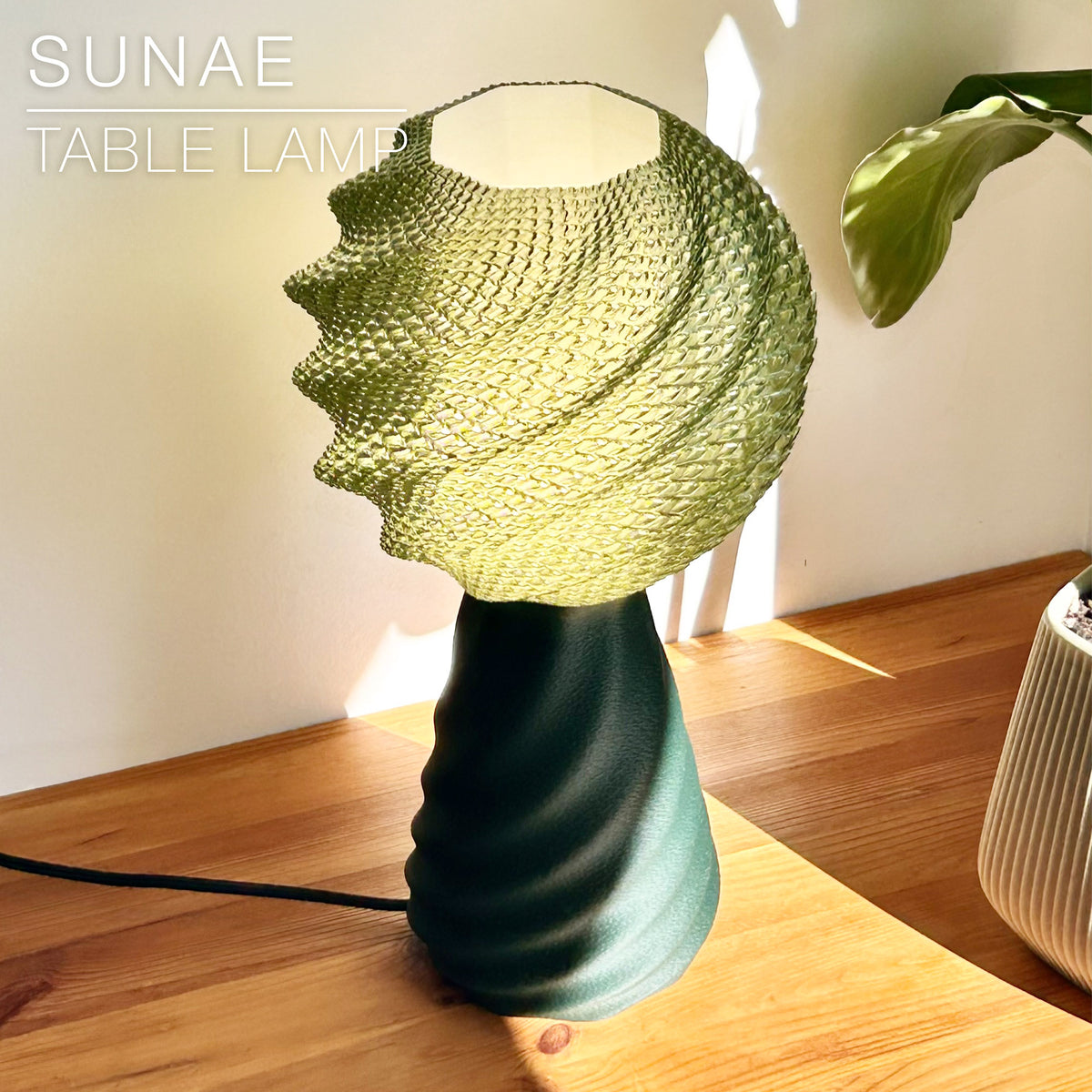 SUNAE table lamp with continuous woven twist shade and base, view 5